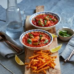 A picture of McCain Spicy Peri Peri Fries with Spanish Prawn Stew.