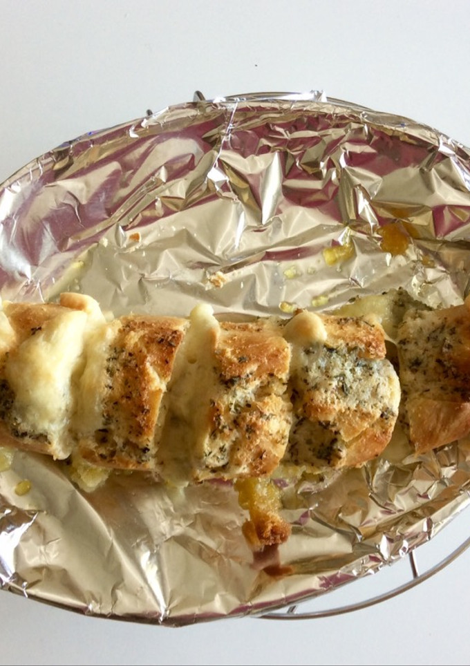 Una foto de Pan de ajo con queso