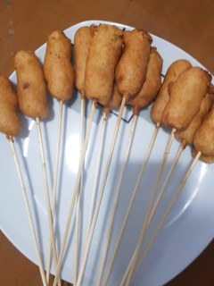 Una foto de Corn dogs
