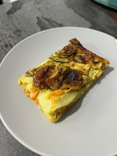 Una foto de “Focaccia” de patatas, boniato y calabacín