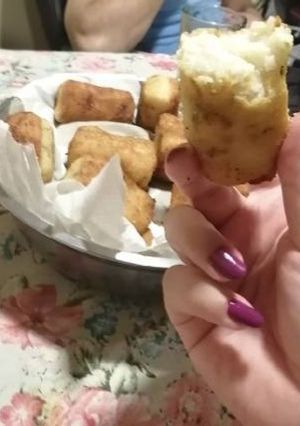 Una foto de Croquetas de arroz frito y queso