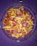 Una salchipapa o panchos con papas🤪