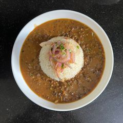 Dal Bukhara With Steam Brown Rice & Onion Salad A picture of Dal Bukhara With Steam Brown Rice & Onion Salad.