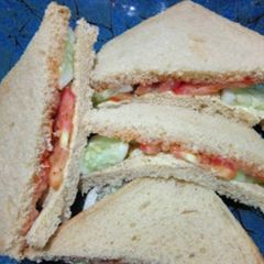 A picture of Cucumber -Tomato Sandwich.