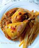 Pollo asado en bolsa al horno con curry vindaloo hingú con papas