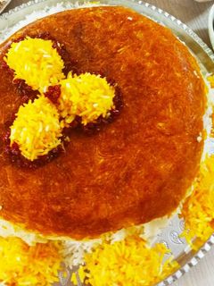 عکسی از دستور ته دیگ سیب زمینی رنده ای