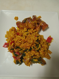 Una foto de Arroz con costillas y espinacas