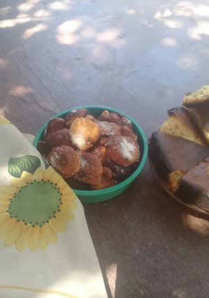 Una foto de Buñuelos espolvoreado con azúcar