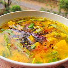 A picture of Dal with Pumpkin and Drumsticks.