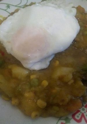 Una foto de Charquicán con huevo