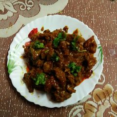 A picture of Spicy Mutton Curry.