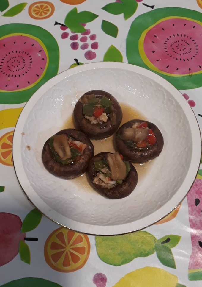 Una foto de Porto bello relleno de langostino y verduras. (Tapas)