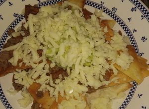 Una foto de Nachos con carne