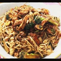 A picture of Broccoli and Chicken in Oyster-Soy Sauce with Shredded Egg Noodles.