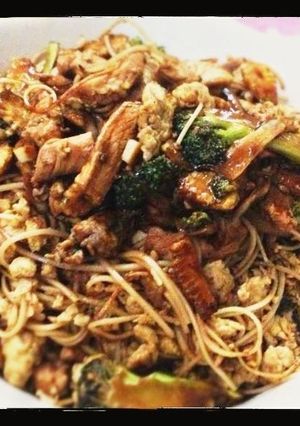 A picture of Broccoli and Chicken in Oyster-Soy Sauce with Shredded Egg Noodles.