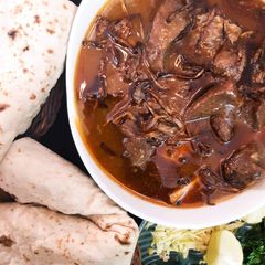 Beef Nihari with Naan A picture of Beef Nihari with Naan.