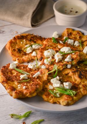 A picture of Cannellini Bean & Carrot fritters withCrumbled feta.