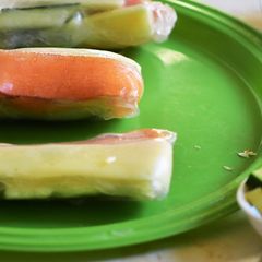 A picture of Rice Paper roll with fresh colorful veggies-all time healthy 2 minutes/roll snack.