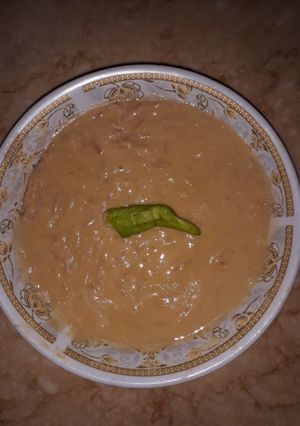 صورة لوصفة العدس بالشعيريه والتقليه الجامده