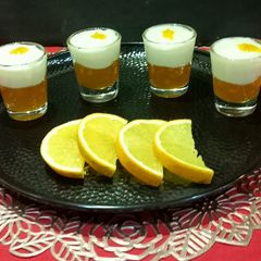 A picture of Orange Jelly Pudding Layer in a Glass.