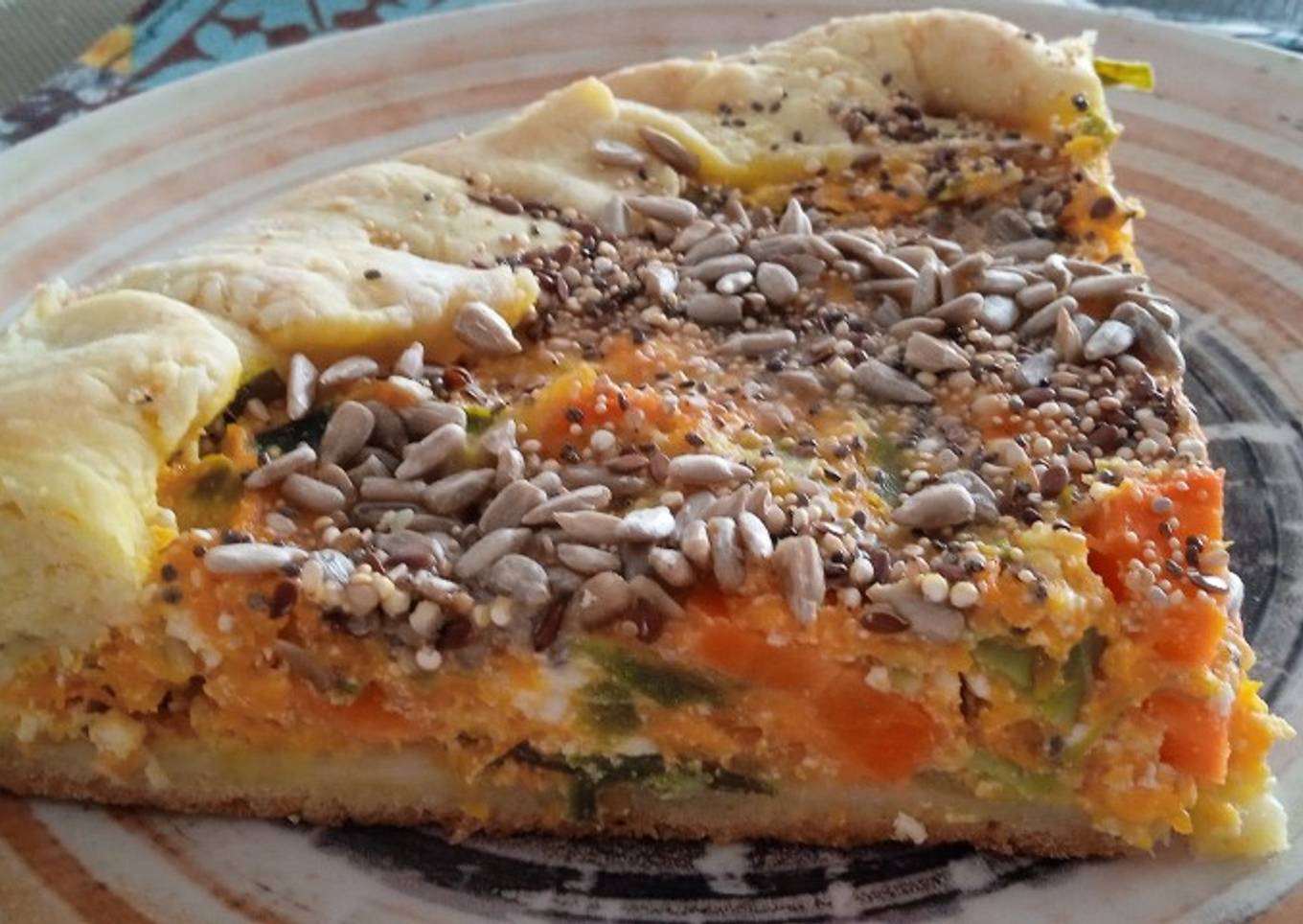 Tarta de zapallo, ricota, vegetales y semillas