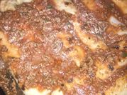 Una foto de picadillo de carne con tomate