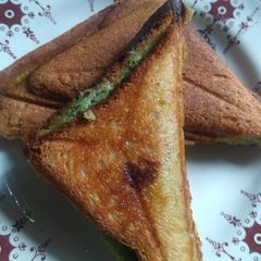 A picture of Cheese and coriander toast.