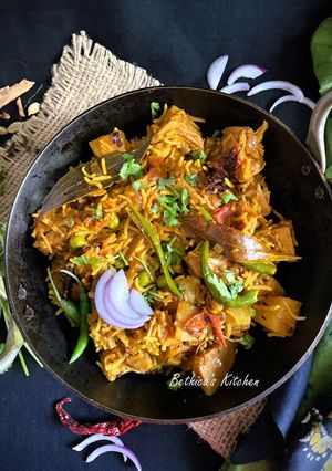 A picture of Echorer Muri Ghonto (Green Jackfruit Cooked with Basmati Rice - Bong Style).