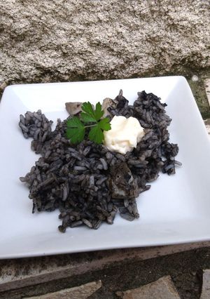 Una foto de Arroz negro con sepia