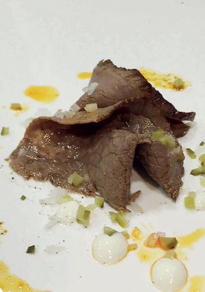 Una foto de Contra de cerdo escabechada