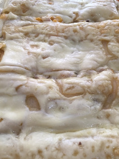 Una foto de Lasagna de pollo, maíz y tocineta