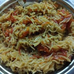 A picture of Sweet rice with Carrot and jaggery.