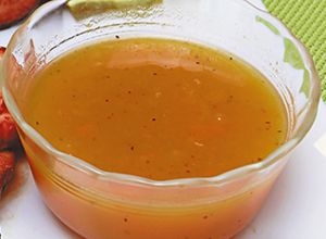 Una foto de Adobo de naranja para aves y carnes