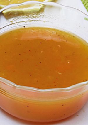 Una foto de Adobo de naranja para aves y carnes