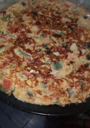 Una foto de Tortilla de tomates y zapallitos