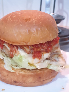 A picture of Cheeseburger with Tomato Puree.