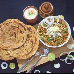 Paneer Bhurji With Masala Lachha Paratha A picture of Paneer Bhurji With Masala Lachha Paratha.