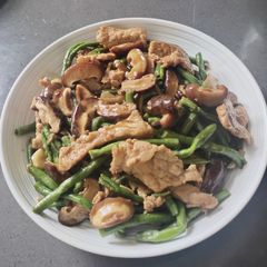 A picture of Stir-Fried Long Beans with Pork and Shiitake Mushrooms.