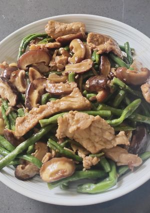 A picture of Stir-Fried Long Beans with Pork and Shiitake Mushrooms.
