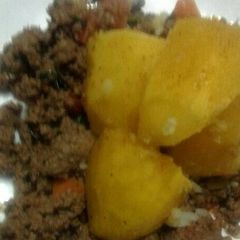 A picture of Steamed Potatoes and minced meat.