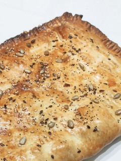 Una foto de Empanada de champiñones y queso crema