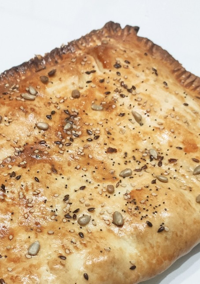 Una foto de Empanada de champiñones y queso crema