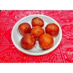 A picture of Bread /Instunt Gulab Jamun.