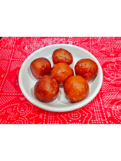 A picture of Bread /Instunt Gulab Jamun.