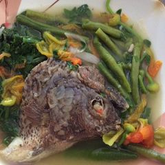 A picture of Dinengdeng with fried fish.