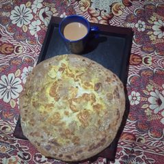 A picture of Anda Paratha With Karak Chai.