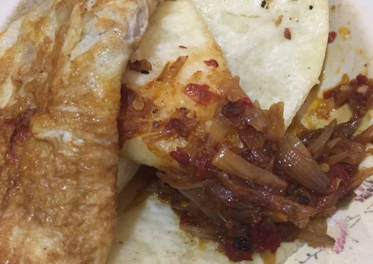 Fried yam,egg with onion sauce