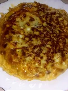 Una foto de Tortilla francesa de cebolla caramelizada