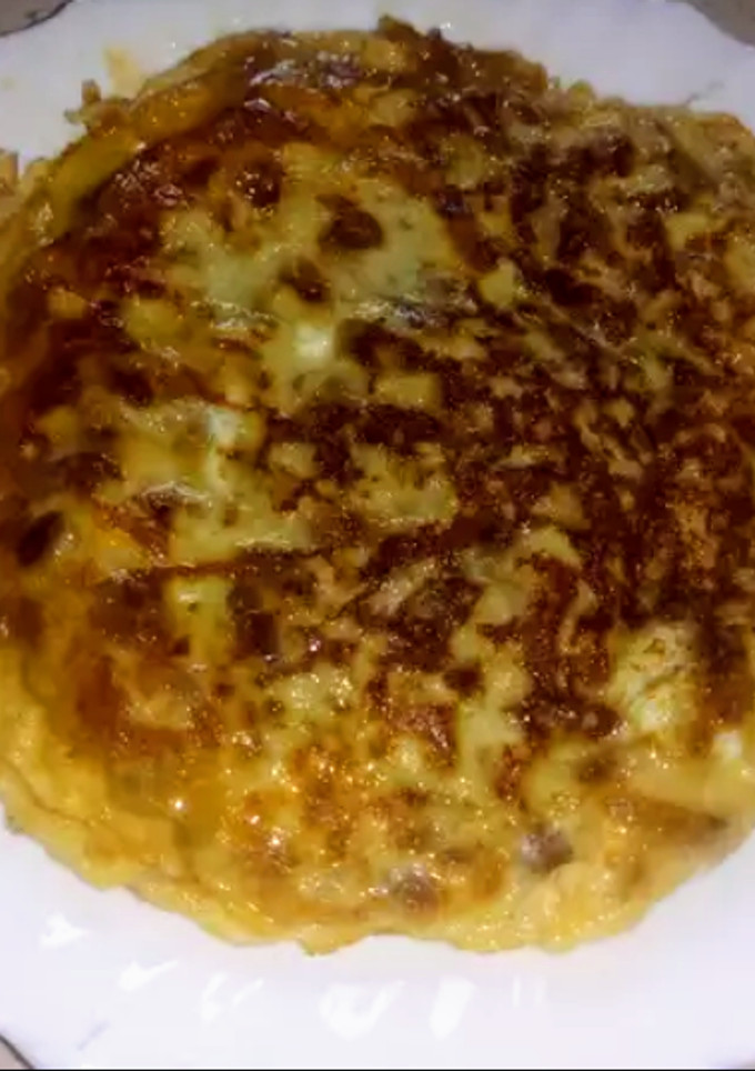 Una foto de Tortilla francesa de cebolla caramelizada