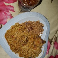 A picture of Peppery noodles and egg.